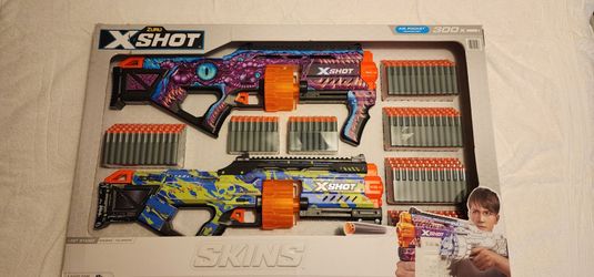 ZURU X- SHOT SKINS LAST STAND GUN 2 PACK WITH 300 DARTS  GAME - NEW IN BOX