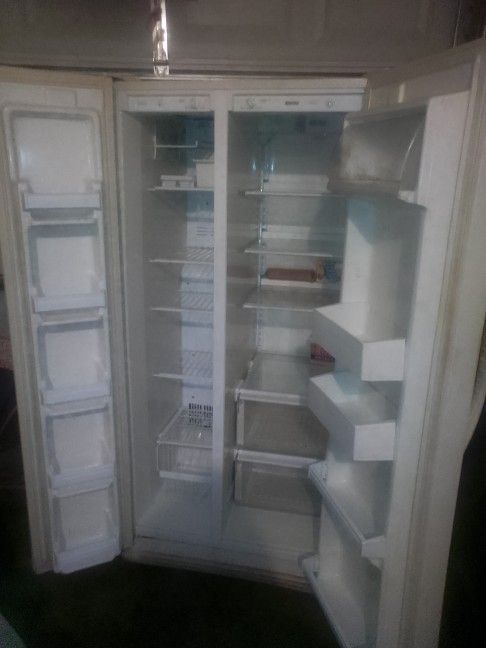 great working Kenmore double door refrigerator delivery available!
