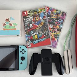 Animal Crossing Nintendo Switch + 2 mario games, case, and accessory