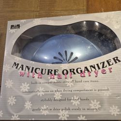 Manicure organizer with hairdryer and twelve piece makeup kit