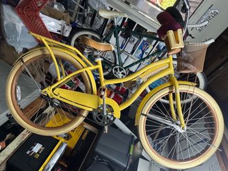 Yellow beach cruiser w/basket