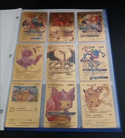 Binder of 27 Pokémon cards. $10 for everything together. Includes Charizard, Mew, Pikachu and more