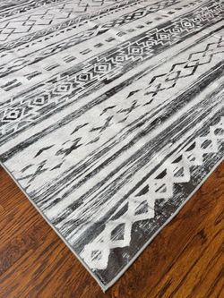 Brand new 8x10 washable area rug set (rug cover + non-slip pad).