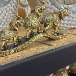 Bronze And Black Elephant Gift Item Size: 12W 6H