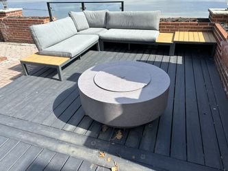 four sectional couches; 2 end tables.;14 cushions and fire pit