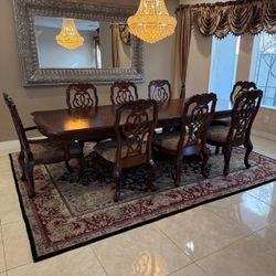 Dark Wood Dining Table with 8 Carved Chairs
