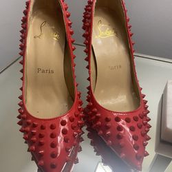 Red Spiked Heels