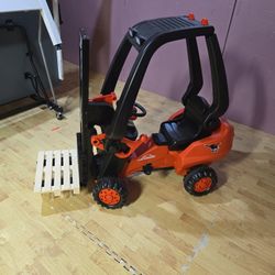 Kids riding forklift toy with pedals