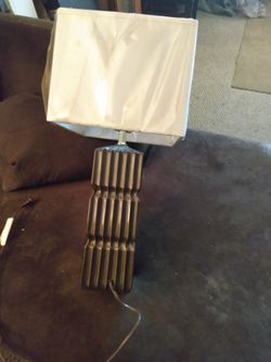 Large beautiful decorative lamp. works with three-way switches and it's ceramic with a nice clean shade $15 OBO