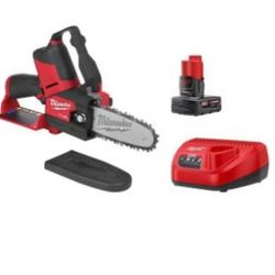 Milwaukee  12v  Chainsaw Beand New In The Box. ($199.00 Firm Price)