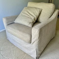 Pottery Barn Slip Covered Swivel Rocker