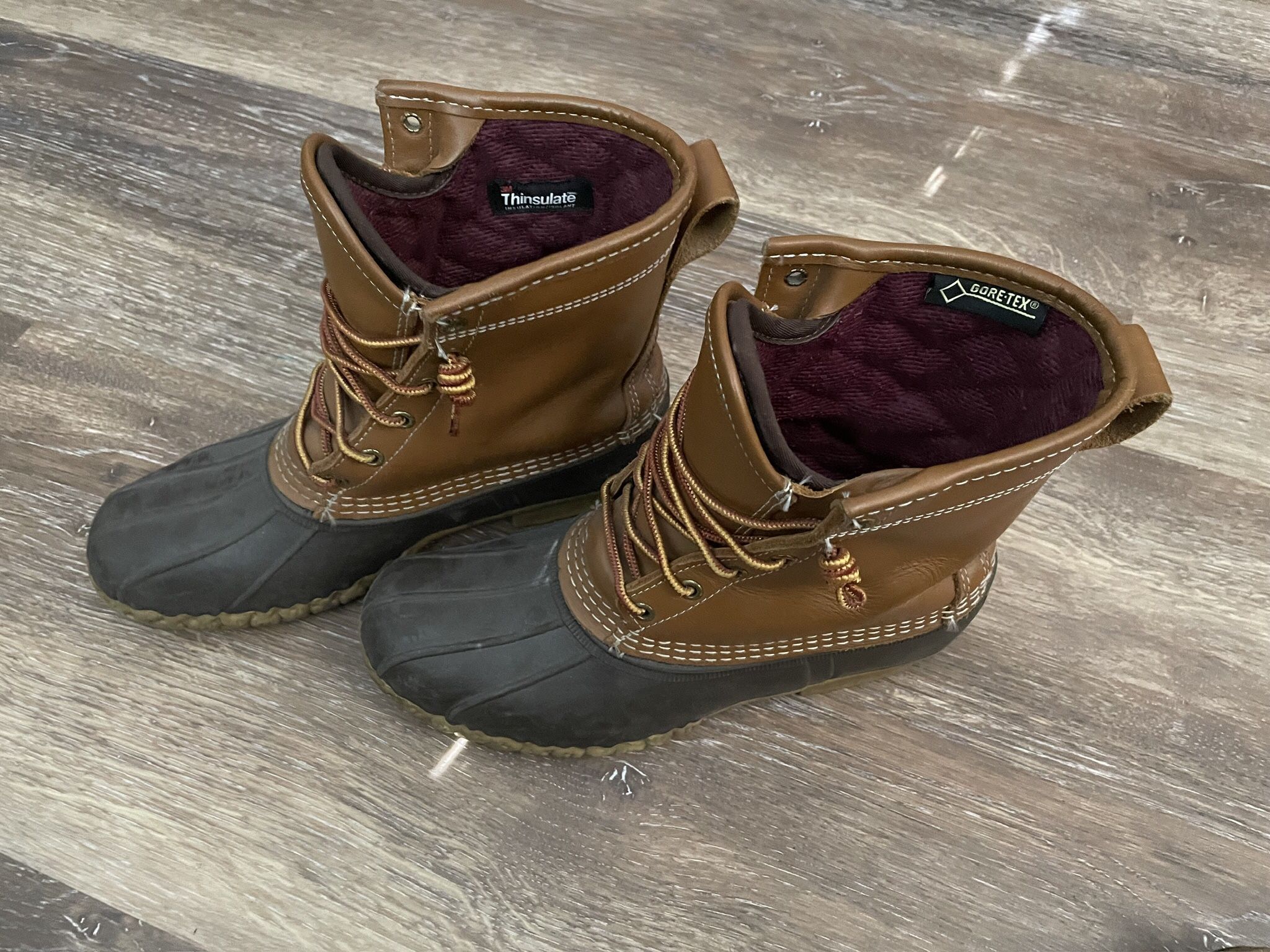 Classic L.L. Bean “Bean Boots” with waterproof rubber bottoms and leather uppers, lined with 3M Thinsulate for extra warmth in cold weather. Made in M