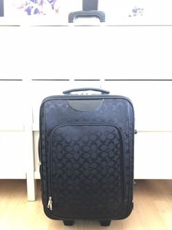 Coach suitcase with wheels new arrivals