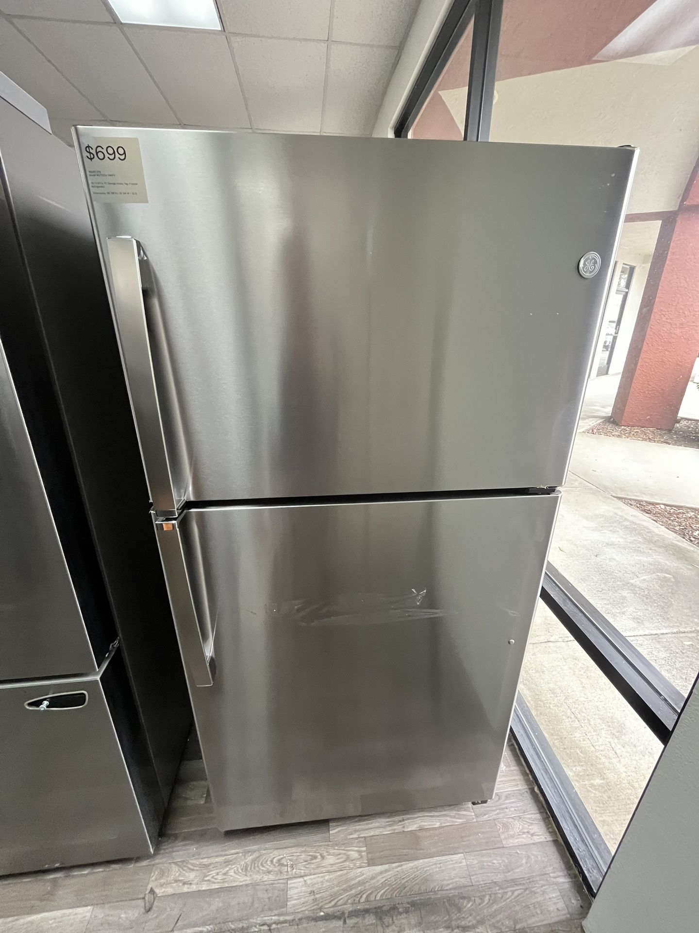 $699 GE 21.9 Cu Ft Garage Ready Top Freezer Refrigerator