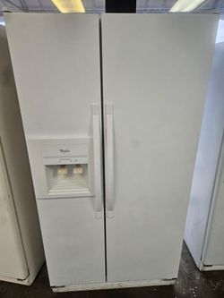 whirlpool double door white refrigerator.