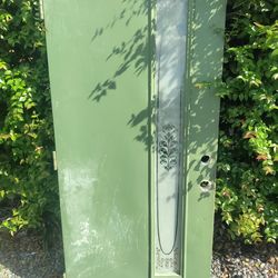 Exterior metal door with glass insert approximately 36x79 one very minor rust spot bottom corner see last photo