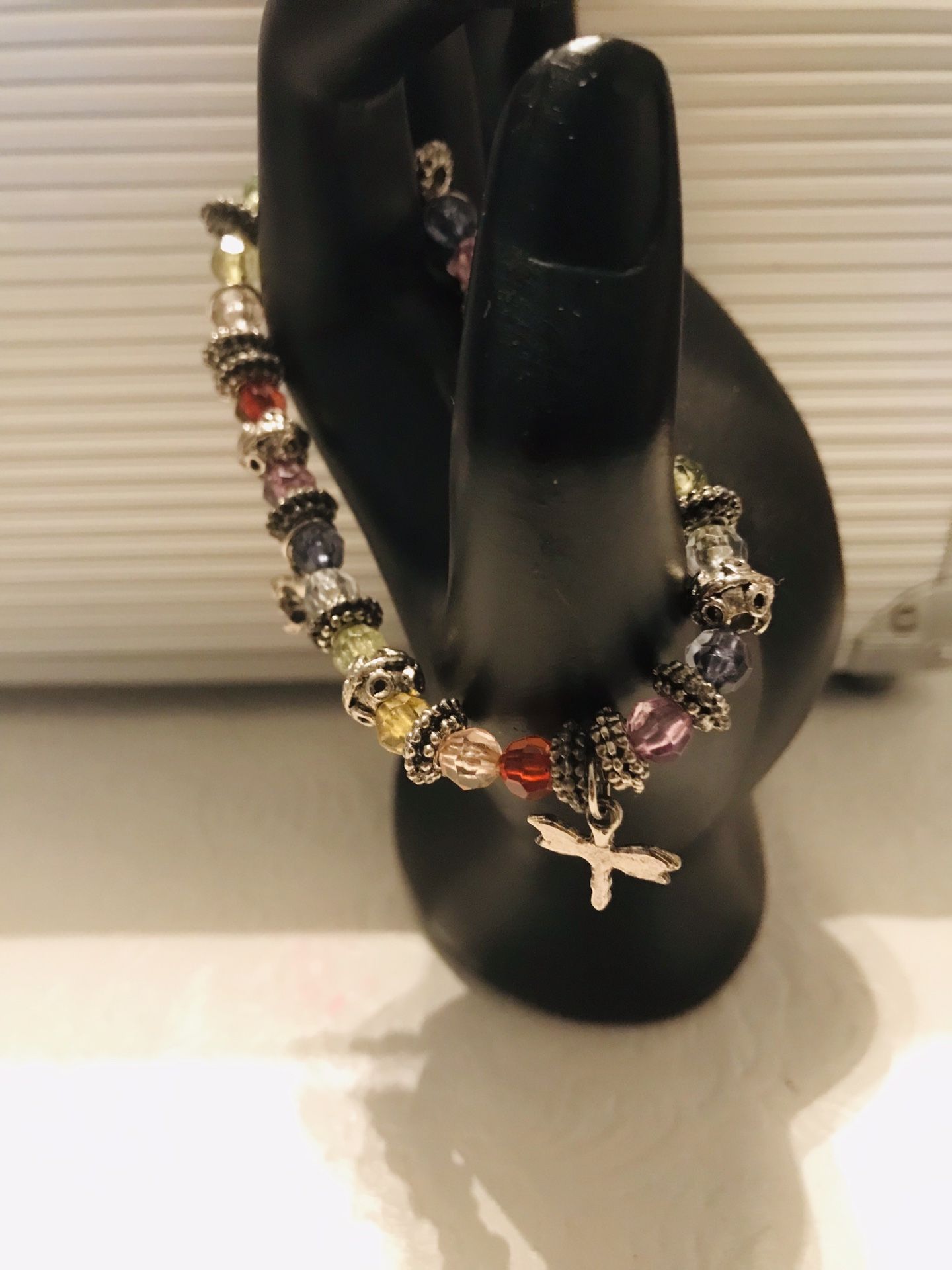 Stretch bracelet with bird and butterfly charms