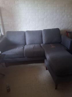L shaped Office Greyish Couch