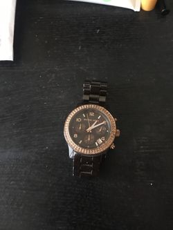 Brown and gold MK watch