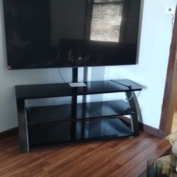65 Inches, and a stand  And Sofa  With Coffee Table 