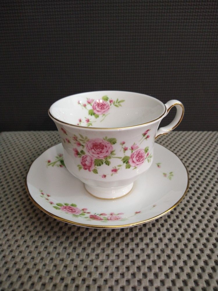 Avon Pink Roses Tea Cup and Saucer Bone China Made in England 1974 