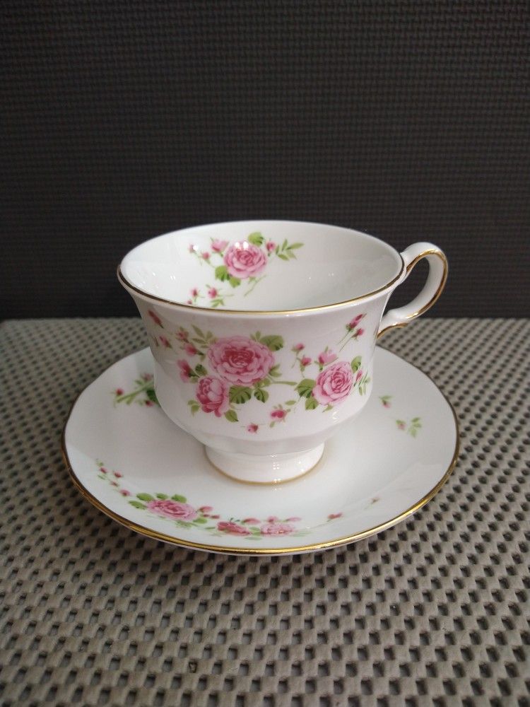 Avon Pink Roses Tea Cup and Saucer Bone China Made in England 1974
