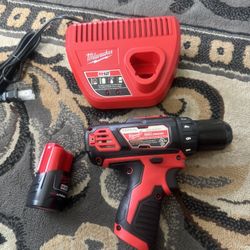 Milwaukee M12 12V Lithium-Ion Cordless 3/8 in. Drill/Driver with battery and charger brand new.