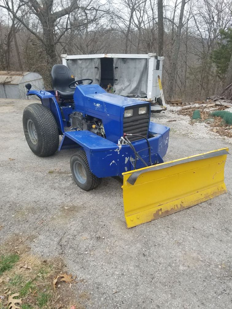 Massey-Ferguson 1030 tractor with snow plow