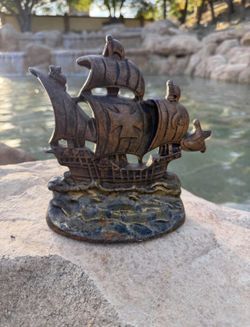 Vintage ship cast iron door stop