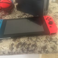 NINTEDO SWITCH (used for a month) (you Also Have To Come Pick It Up)