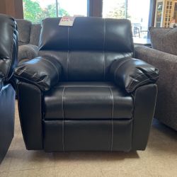 Black or brown rocker recliner 399