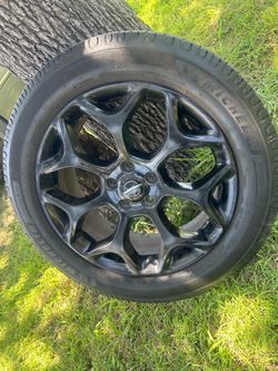 4 Chrysler rims and tires