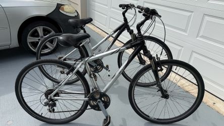 His and Hers bikes Trek Gary Fisher hybrid 700c bicycles 21 speed