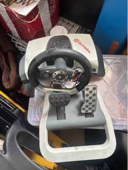 Xbox 360 steering wheel and pedals