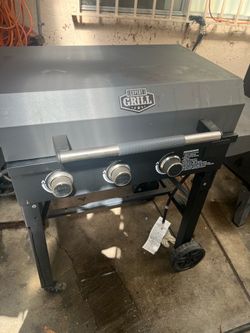 Taco grill with stainless pan.