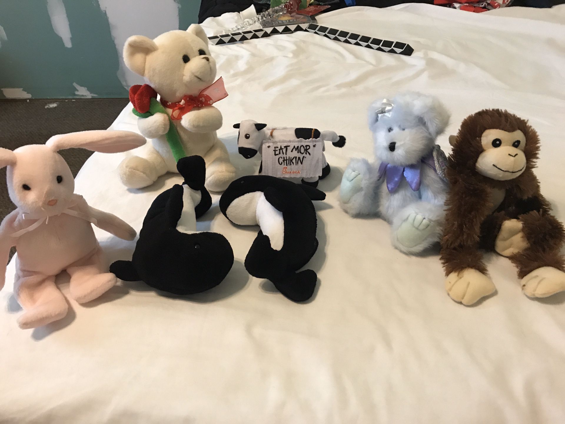 Assorted stuffed animals moveable blue angel bear monkey chick fil a cow rabbit whales 7 total