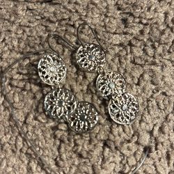 Thin metal swirled earrings home made one of a kind