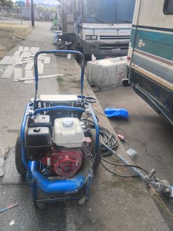 Honda-powered Bunyan Striker Roller Screed.