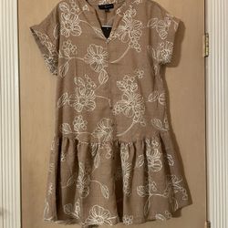 Adorable size small women’s tan  w/white stitching/embroidery dress   Tags still attached. 