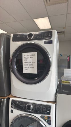 New scratch and dent Electrolux front load washer and dryer set. 1 year manufacturing warranty