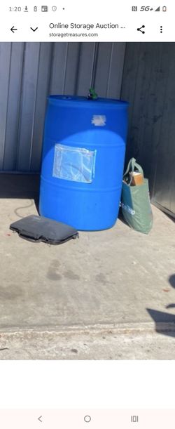 Empty 55-gallon blue plastic drums