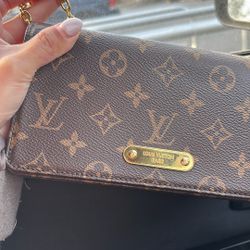 LV Lily Wok Auth Bag 