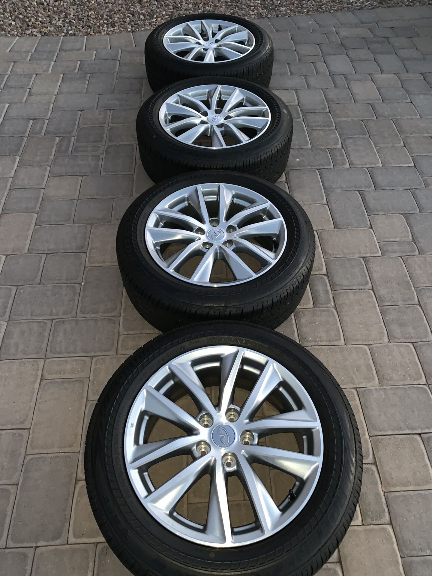 Infiniti wheels and tires 17 inch OEM