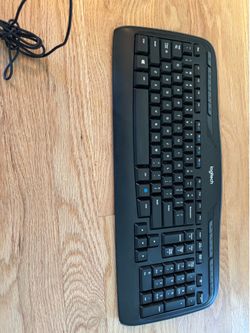 This is a Logitech Wireless Combo MK330, featuring a K330 model black keyboard with multimedia hot keys.