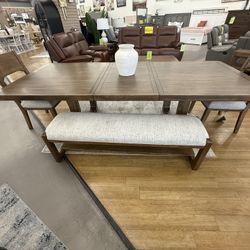 Wood tone dining set with Coffee Table and Wall Server
