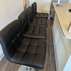 Four Black Bar Stools 