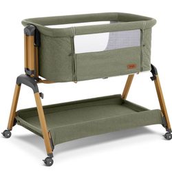 Three and one Bedside Sleeper Rocking Bassinet(MONROVIA) Like New 