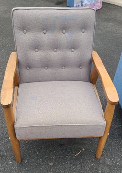 Gray chair with wood accents