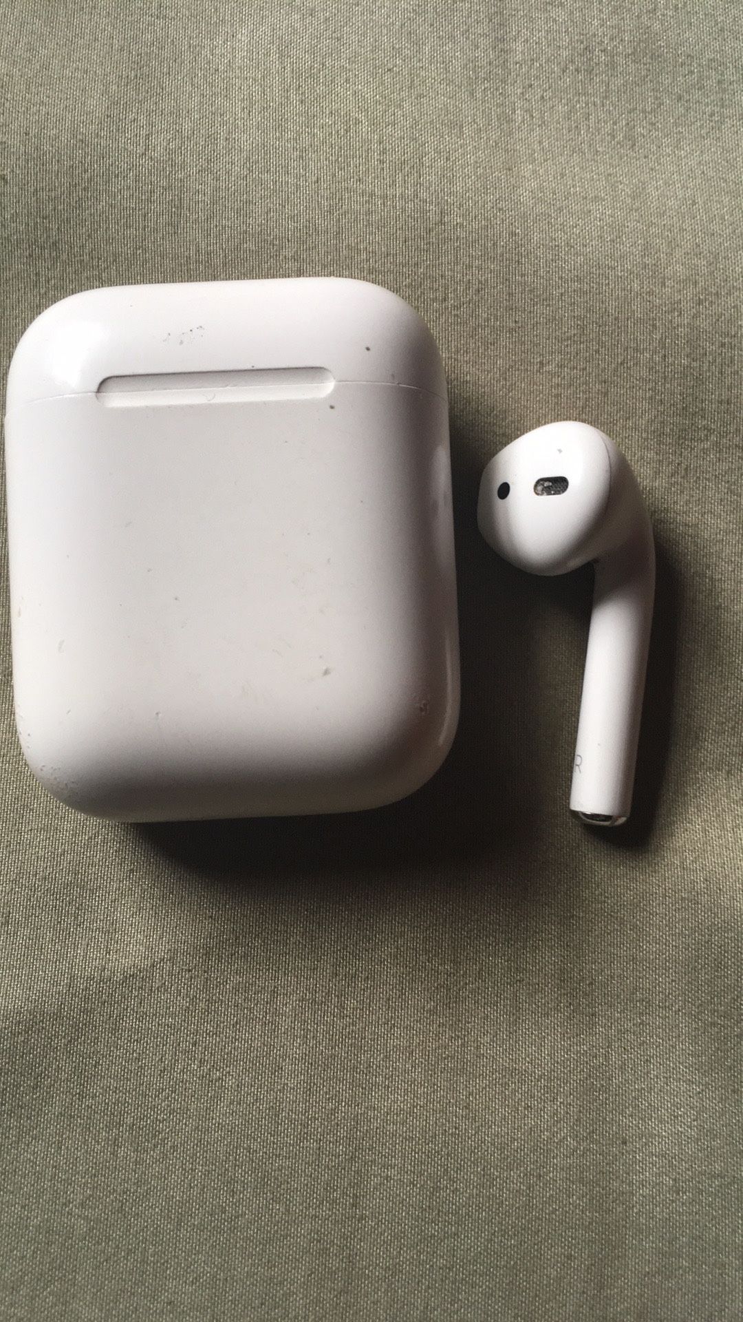 Right Apple air pod and charging box
