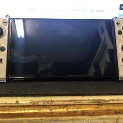 Nintendo Switch OLED with 26 Games- Barely Used